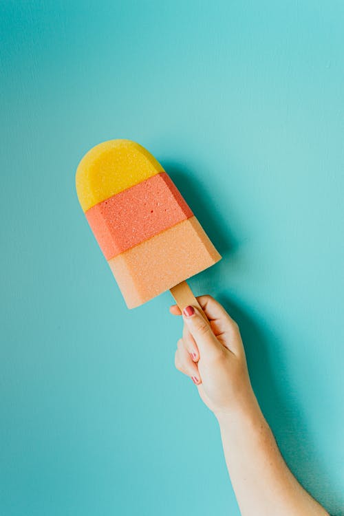 Free Colorful ice cream on blue background Stock Photo