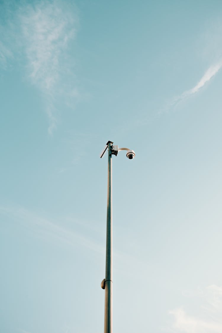 Modern Security Camera On High Column