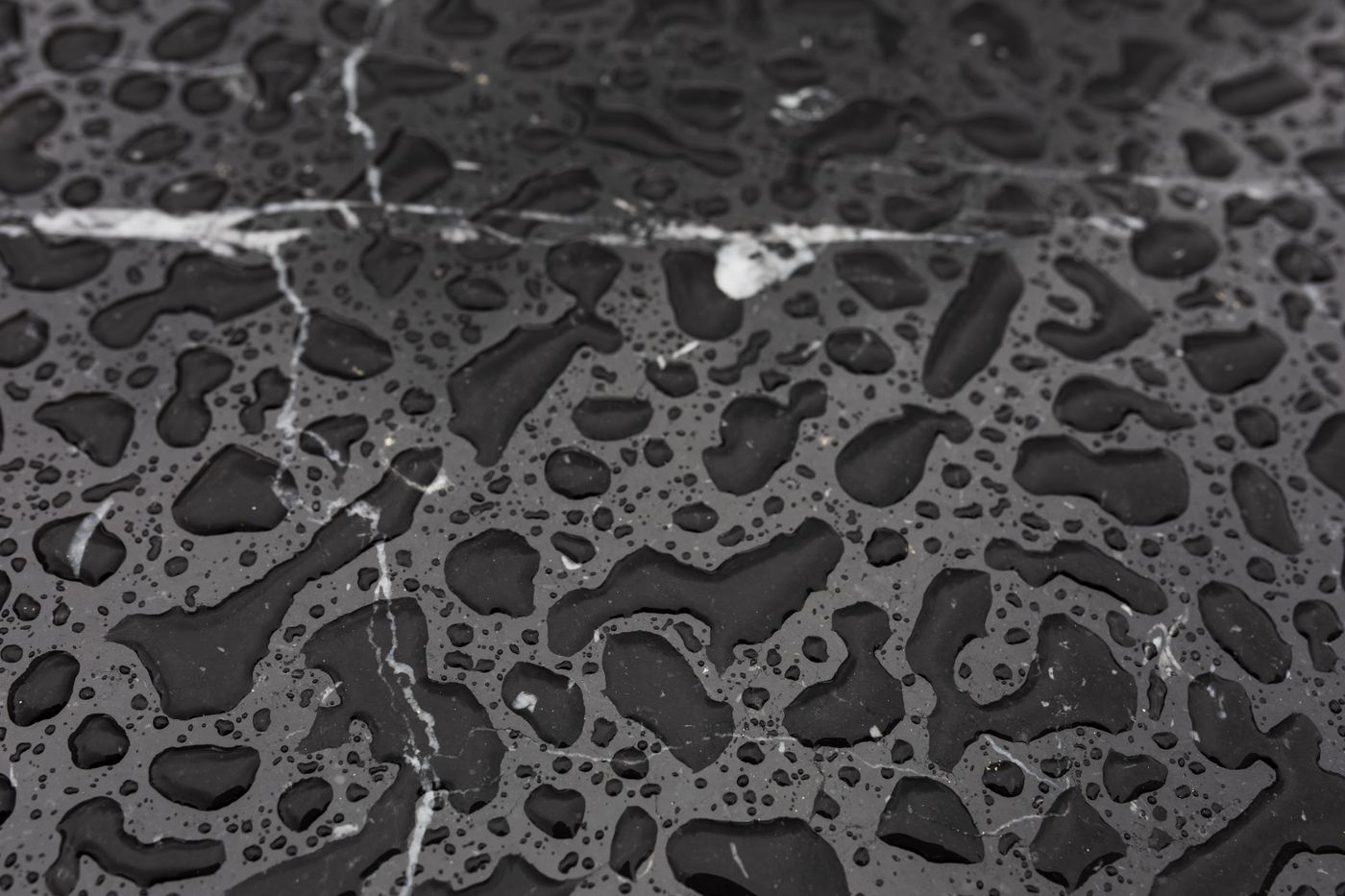 Macro shot of a welded seam on dark coated fabric — photo by kaboompics.com on Pexels