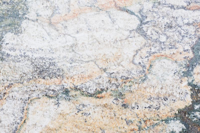 Carrara marble surface — classic white stone with fine grey veining detail
