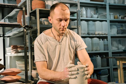 A Man Molding a Clay Pot