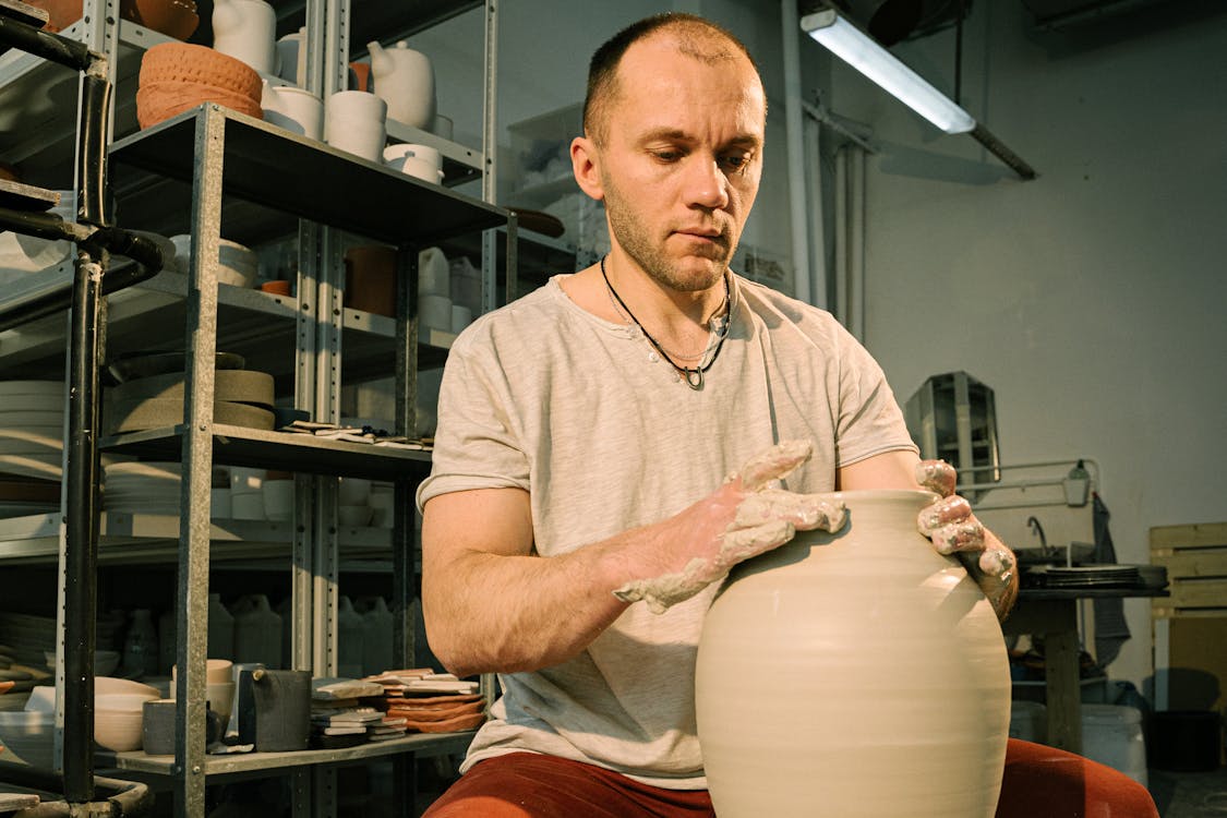 A Man Molding a Clay Pot