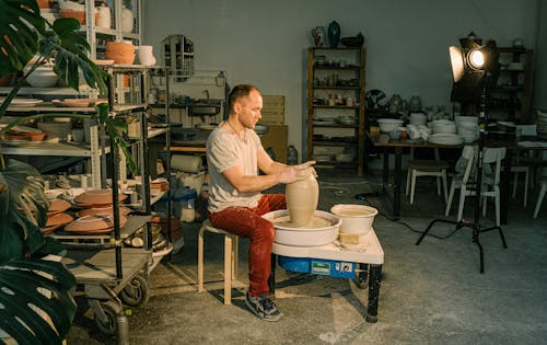 Free Photo of Man Molding Clay Jar Stock Photo