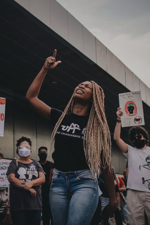 Free A woman passionately leading a social justice protest in Niterói, Brazil. Stock Photo