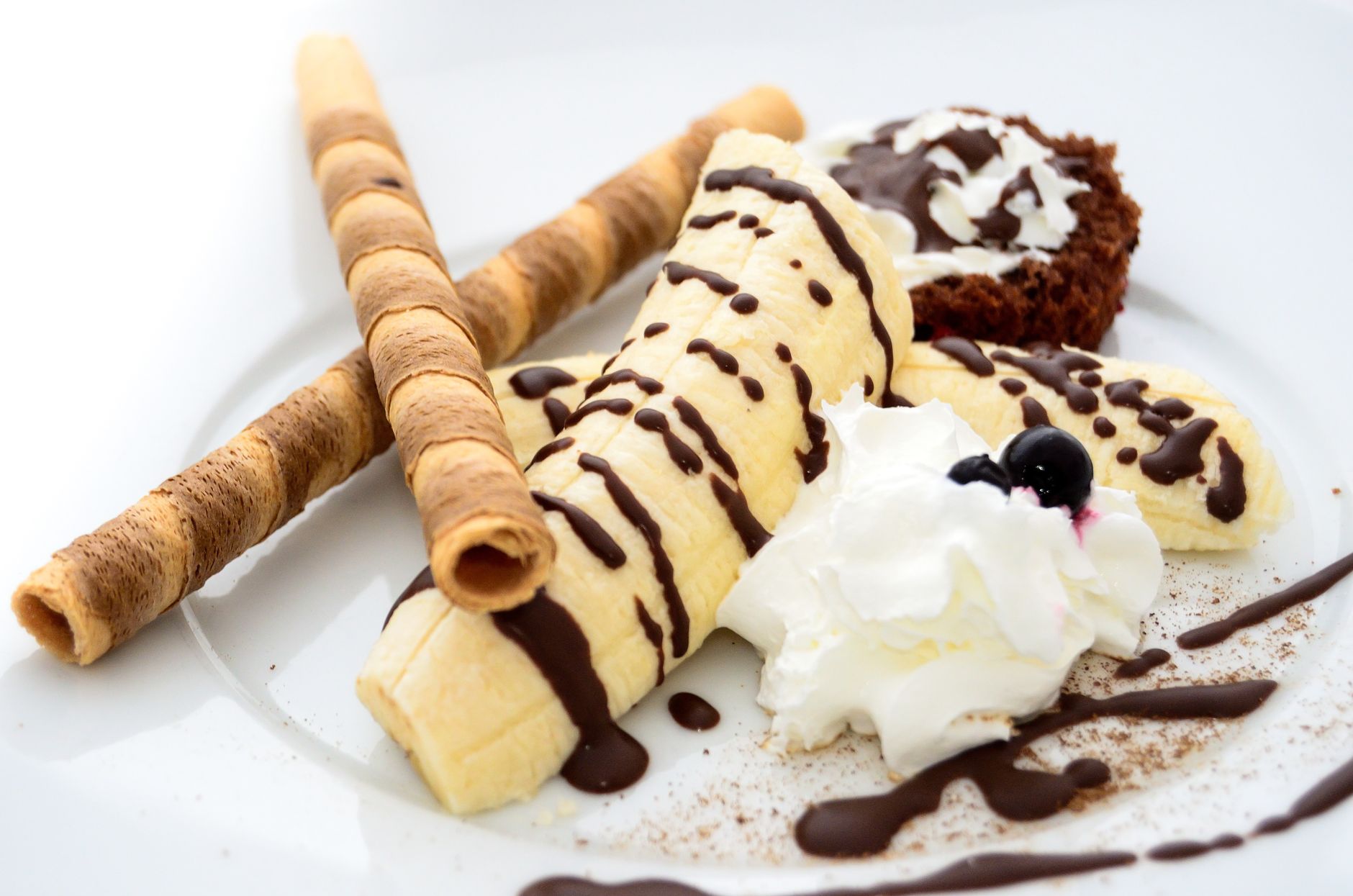 Creamy banana ice cream scooped into bowls