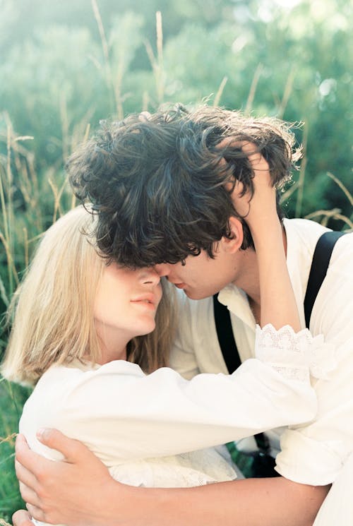 Free A Man and a Woman Kissing Each Other Stock Photo