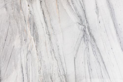 Free Detailed white marble texture showcasing natural veins and patterns for design and architecture. Stock Photo