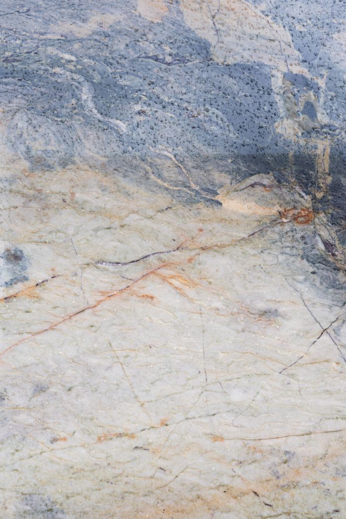 Close-up of blue and white veined marble surface
