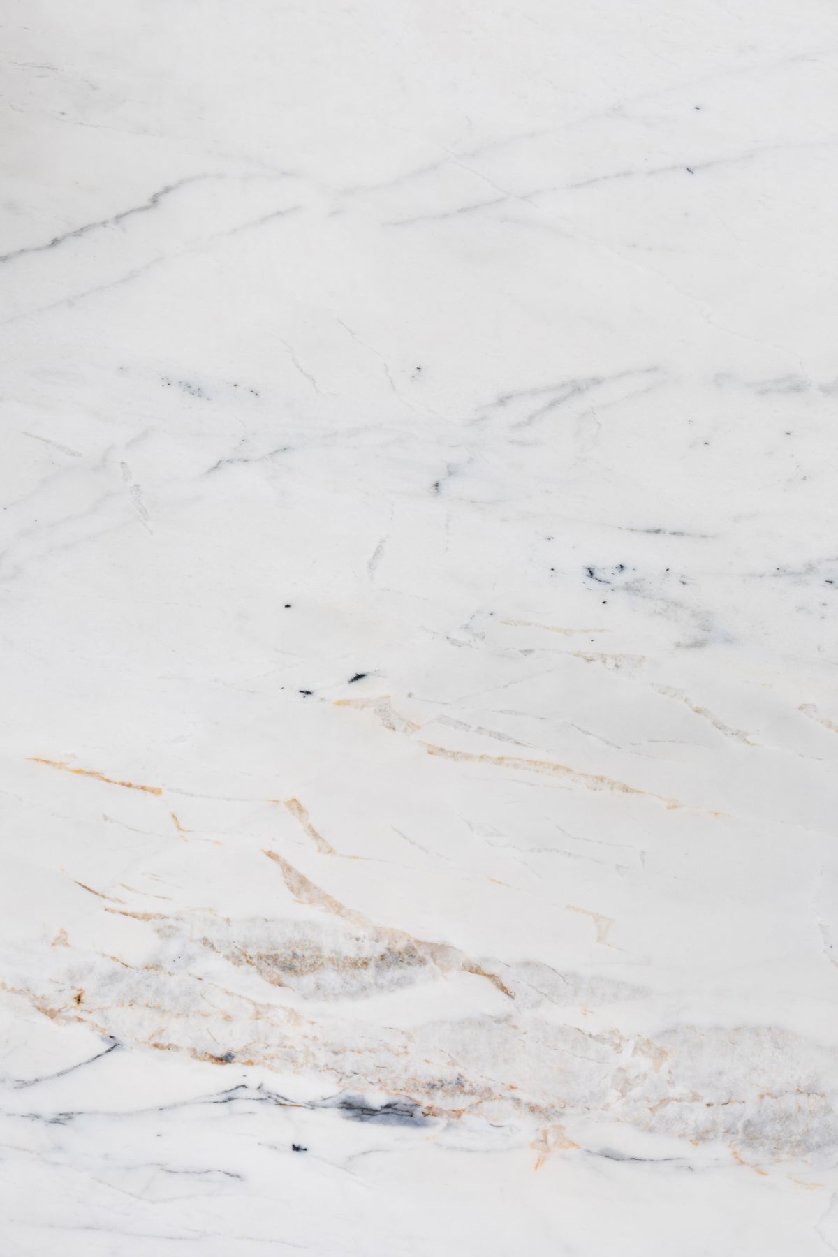 White marble with warm gold accents