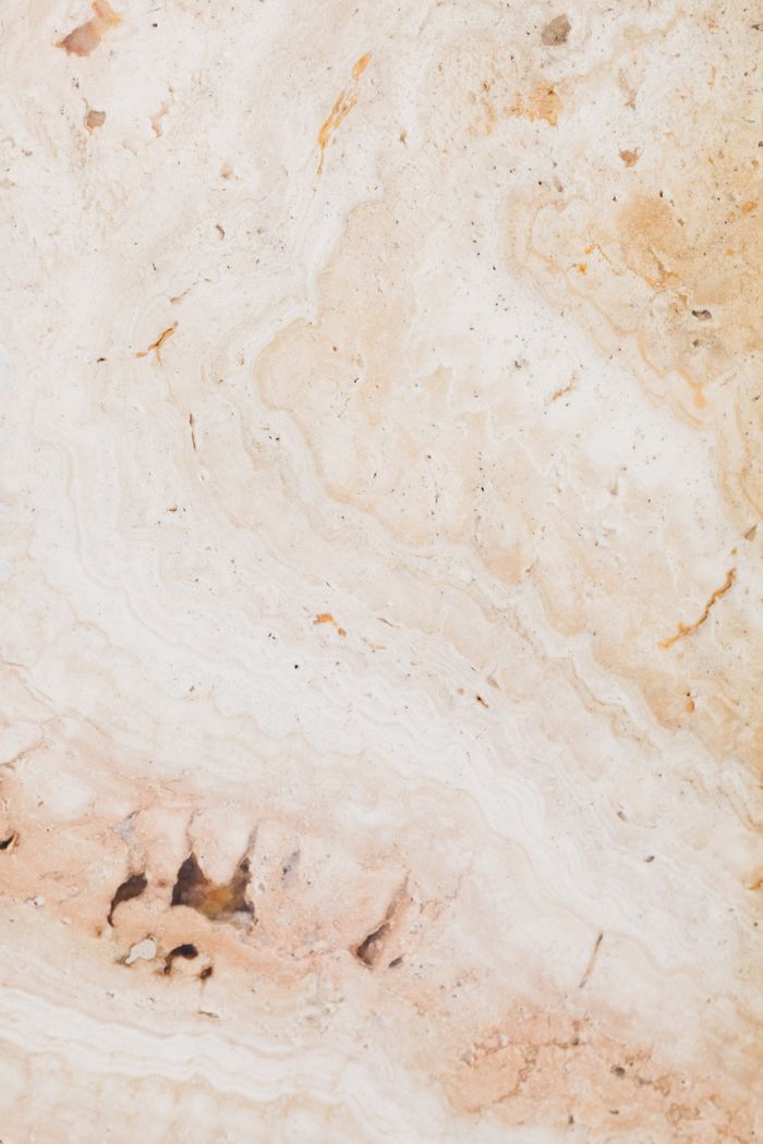 Close-up of blush pink natural stone texture