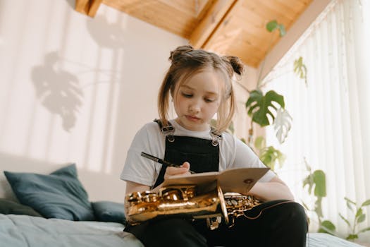 Girl writes music notes while holding a saxophone, surrounded by plants indoors.