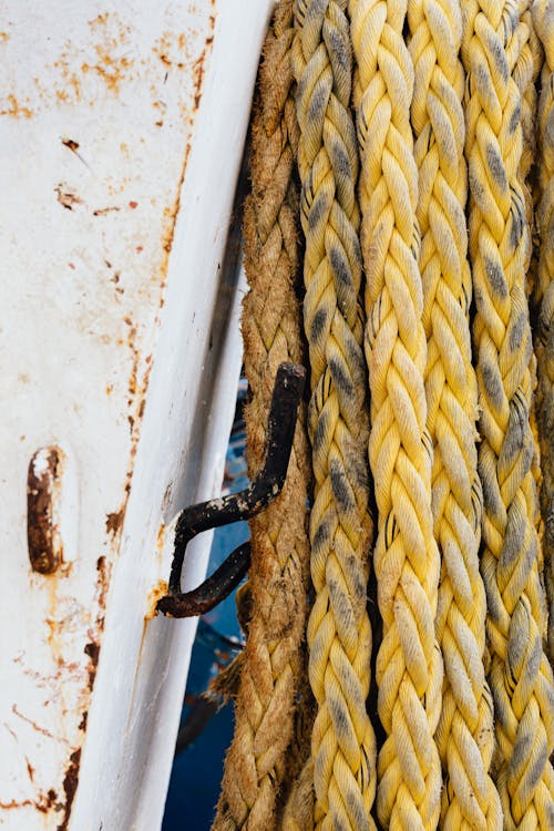 Free Dirty Ropes Tied to a Rusty Dock  Stock Photo