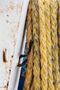 Brown Rope on White Wooden Surface