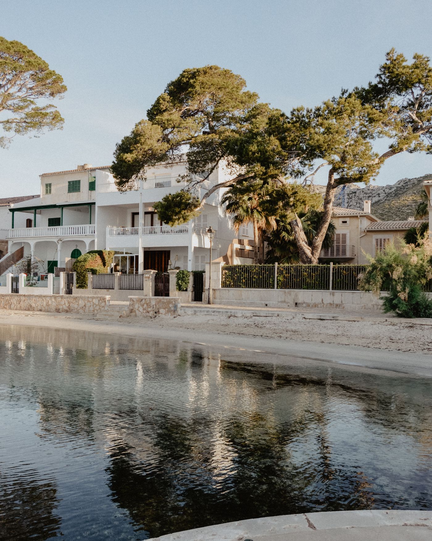 Houses and trees along the waterfront at Port de Pollença, Mallorca