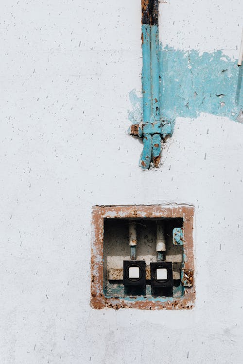 Free Hole with Electricity Box in Wall Stock Photo