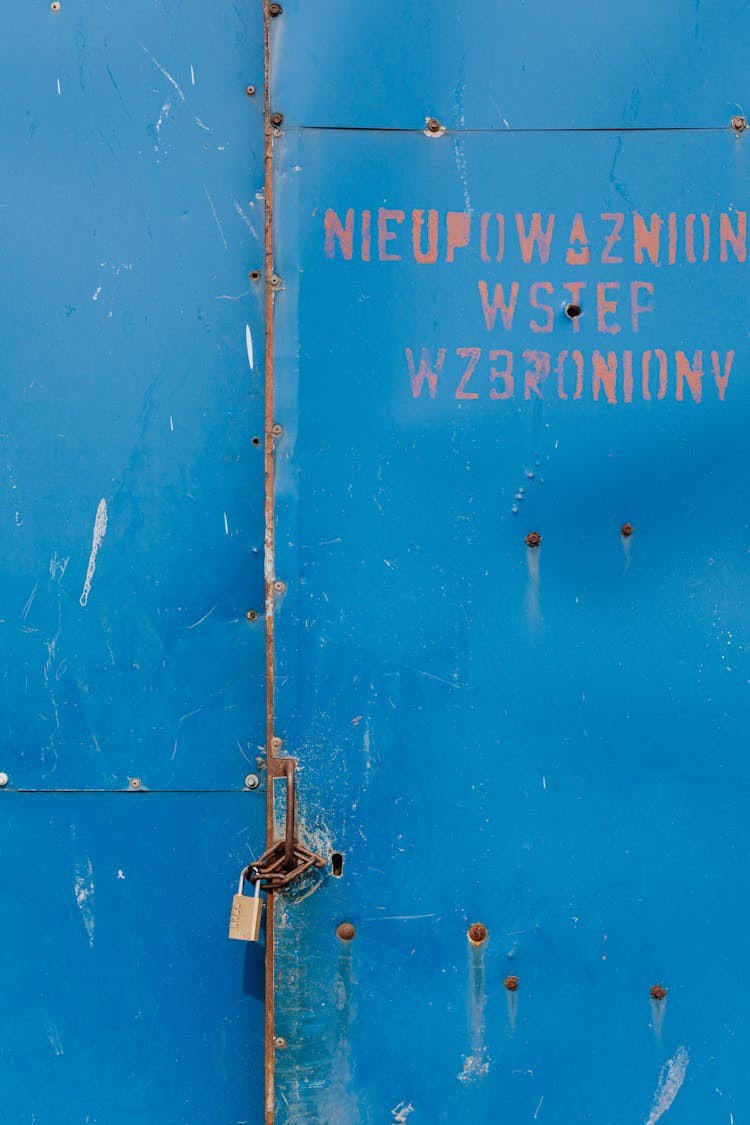 Padlock On A Blue Gate