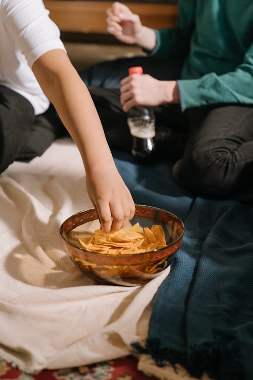 Free Person Holding Brown Ceramic Bowl Stock Photo
