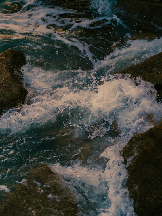 Water Waves Hitting Rocks