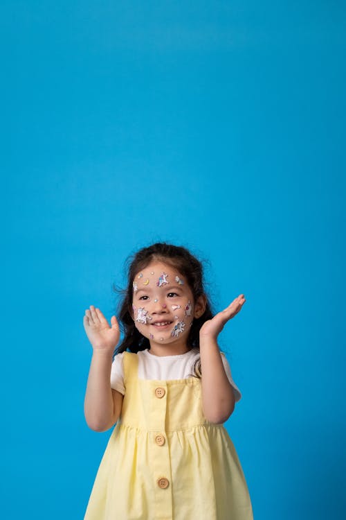 Girl in Yellow Sleeveless Shirt