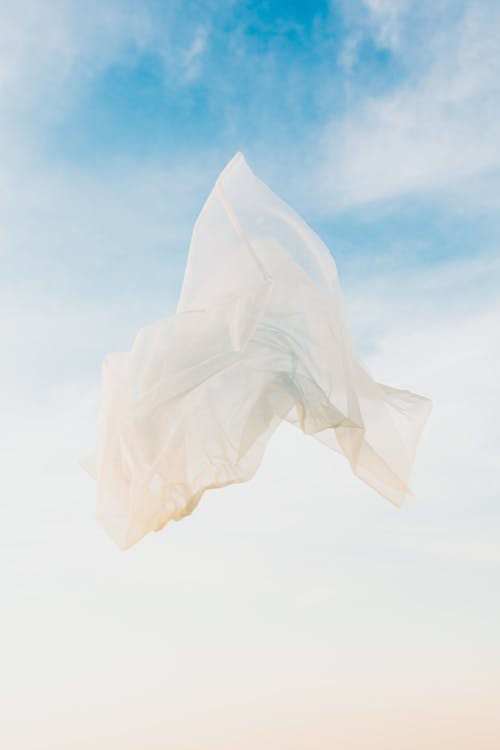 Free Flowing White Textile Under Blue Sky Stock Photo
