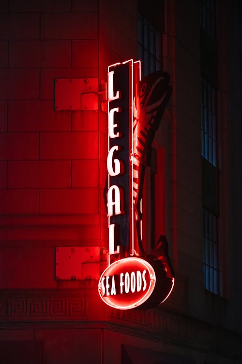 Red and White Neon Light Signage