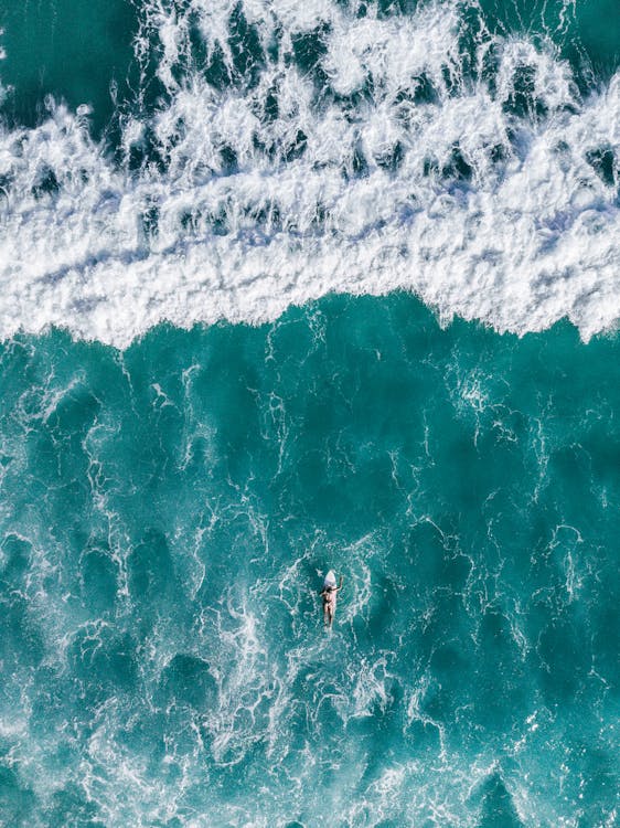 Top View Photo of Person Surfing · Free Stock Photo