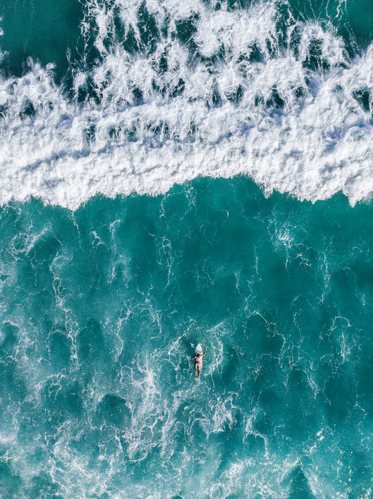 Top View Photo Of Person Surfing