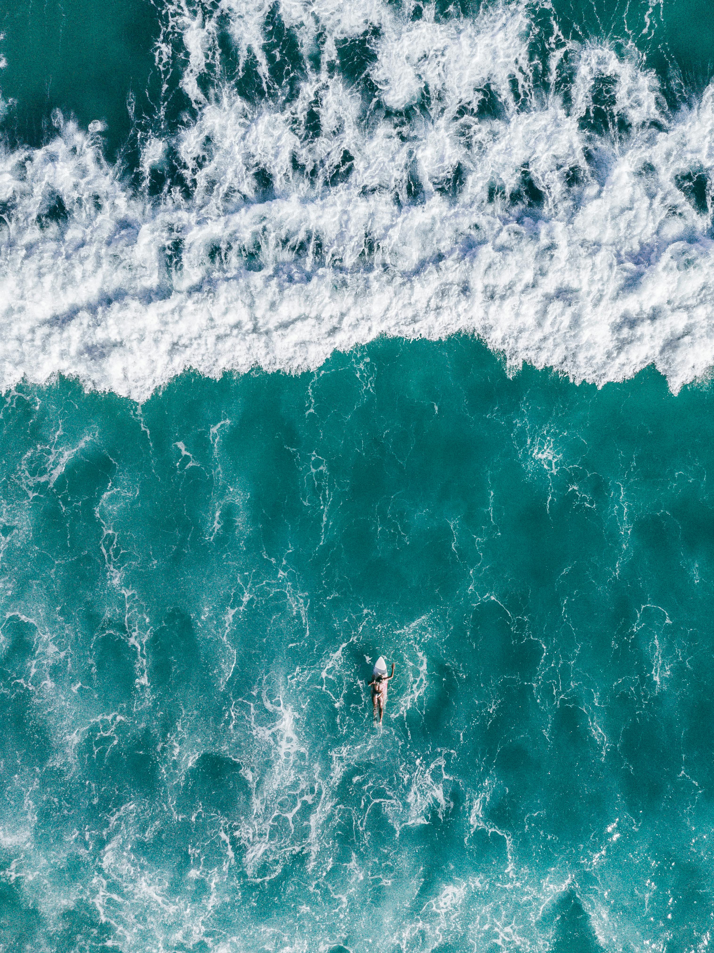 Top View Photo of Person Surfing · Free Stock Photo