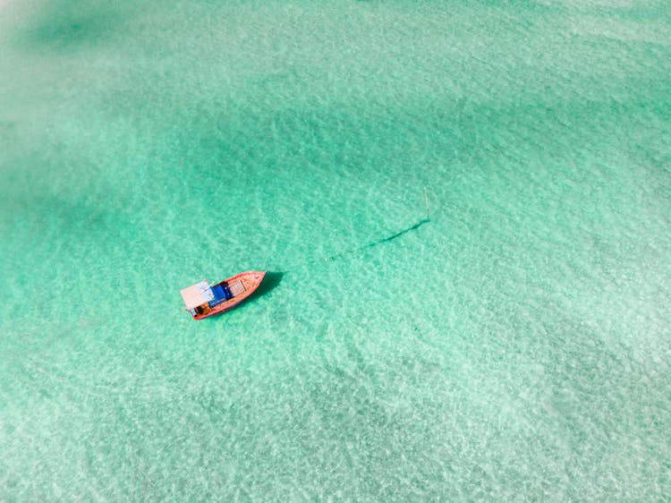 Aerial Photo Of Boat On Sea