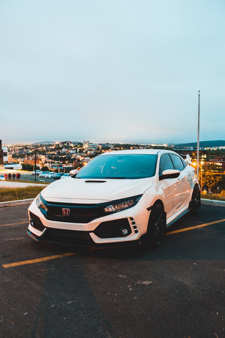 White Racing Car On Parking Lot