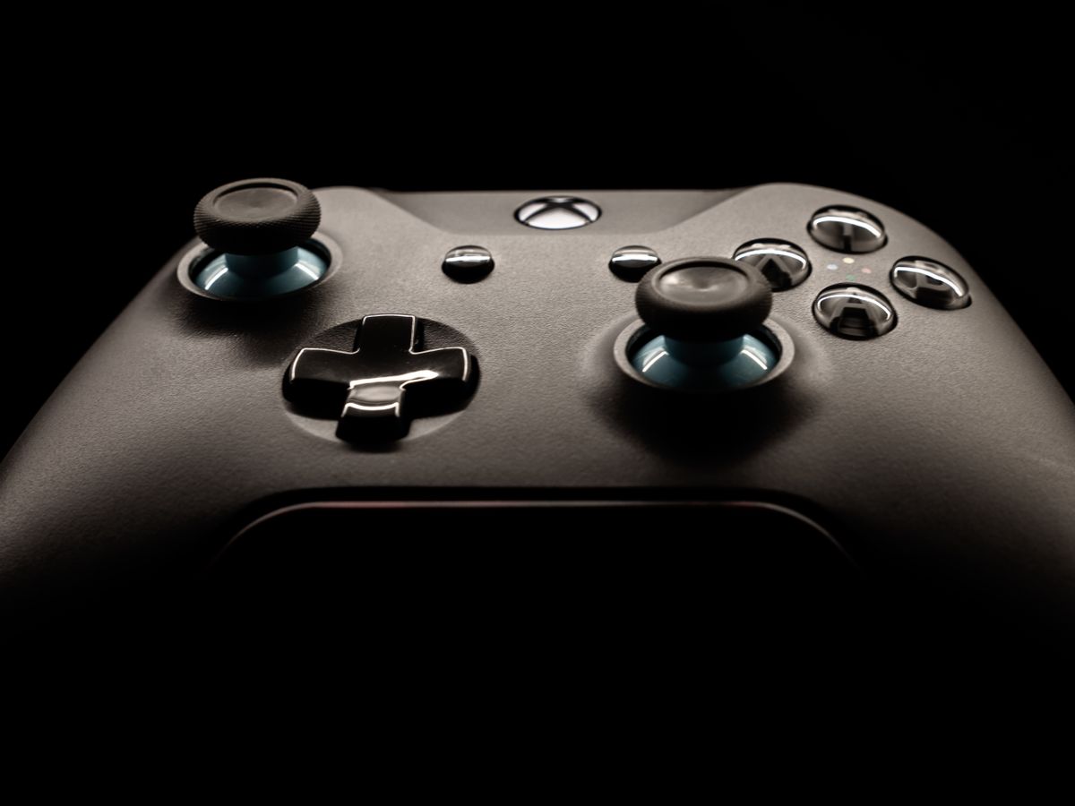 Close-up of a black Xbox game controller, illustrative photo