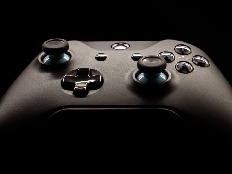 Close-up of a black Xbox game controller, illustrative photo