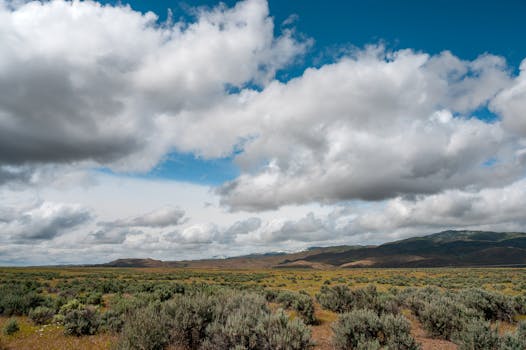 Beautiful mountain landscape under a cloudy sky, capturing the peacefulness of nature.