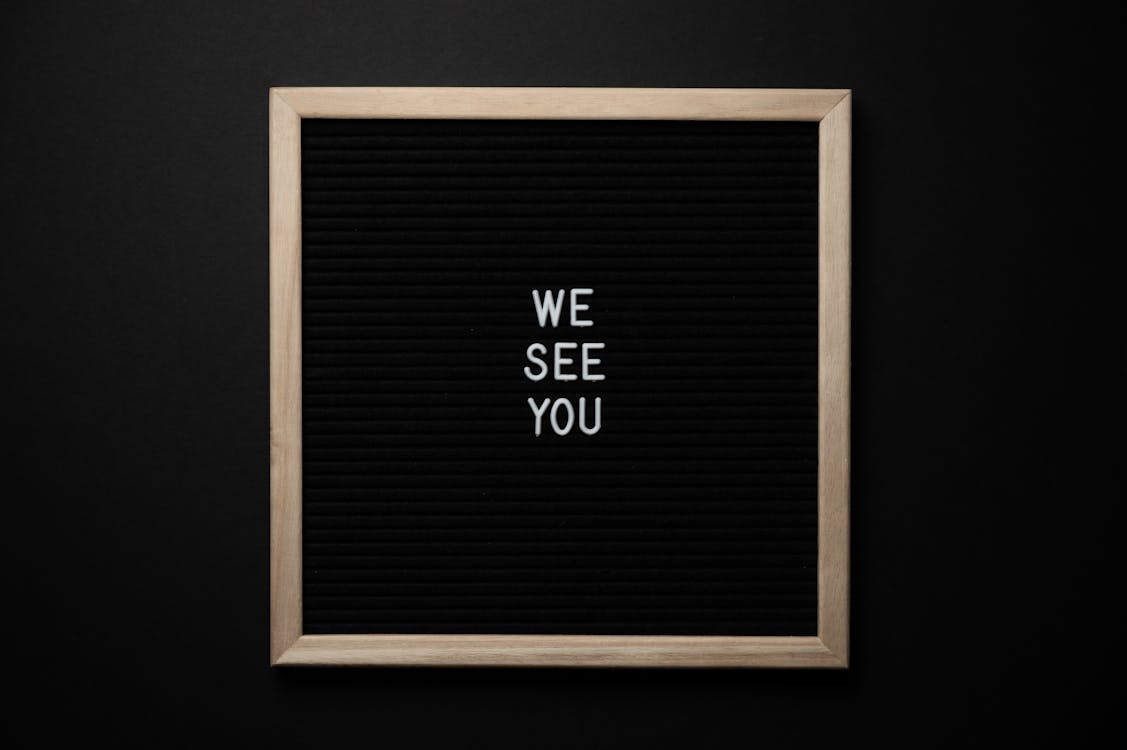 Free Chalkboard with white We See You inscription Stock Photo