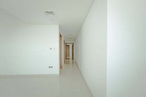 A White Hallway of a Building