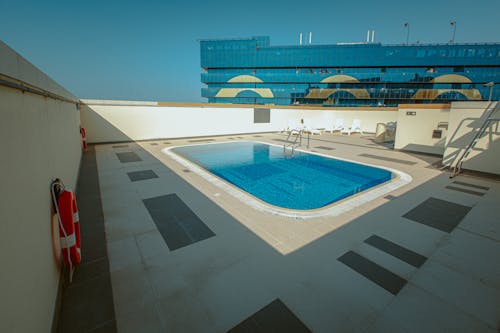 bezplatná Základová fotografie zdarma na téma bazén, Dubaj, plavecký bazén Základová fotografie