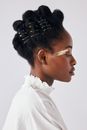 Woman in White Shirt With Silver Earrings
