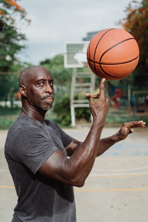 Free Man with Basketball Stock Photo