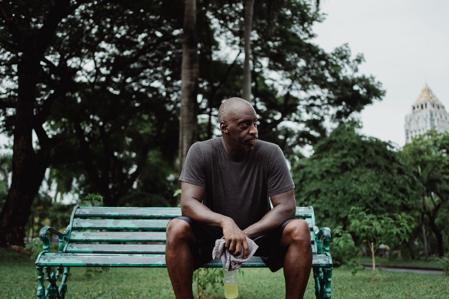 Active Black man in his 50s exercising outdoors