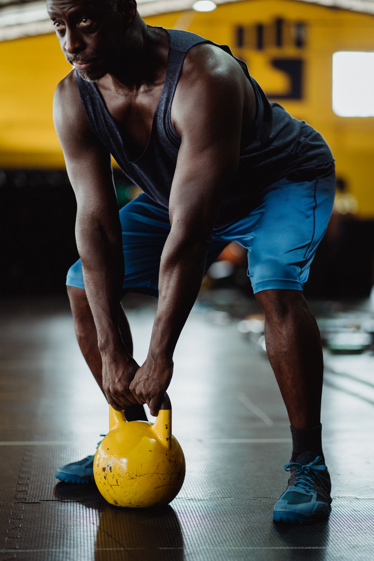 Athlete performing kettlebell exercise with focus
