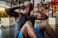 Man in Gray Tank Top Doing Exercise