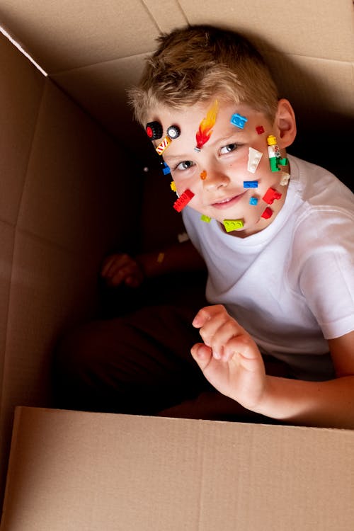 Free Boy in White Crew Neck T-shirt With Face Paint Stock Photo