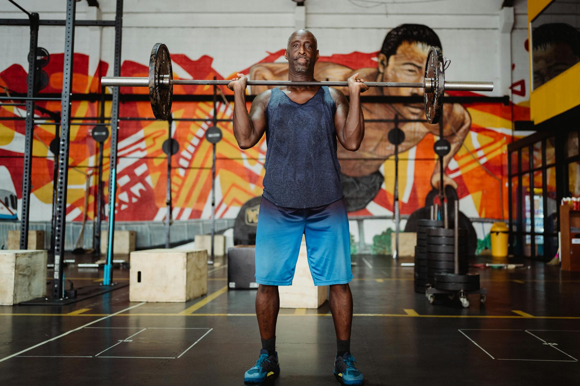 https://www.pexels.com/photo/man-lifting-a-barbell-4720773/