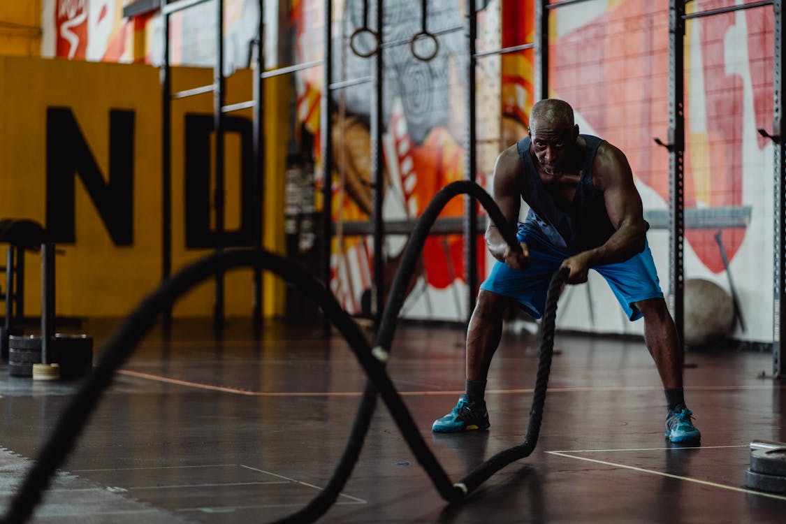 Man Doing Battle Rope Workout · Free Stock Photo