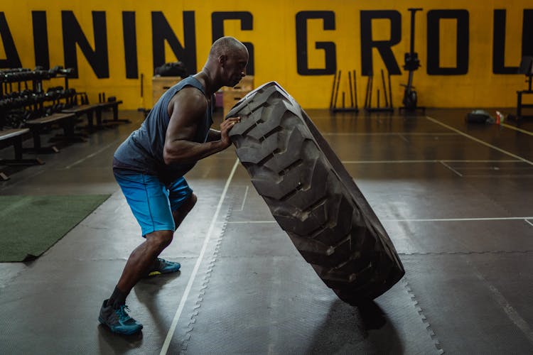 Man Doing Tire Training Exercise