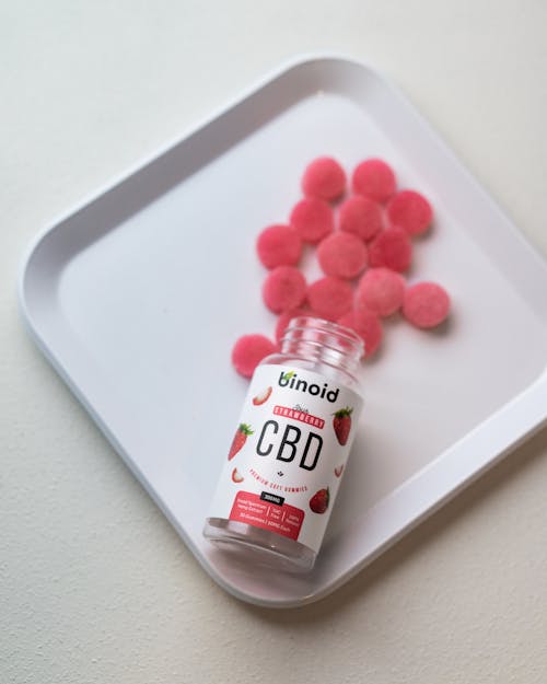 Free Pink CBD Gummies on White Tray  Stock Photo