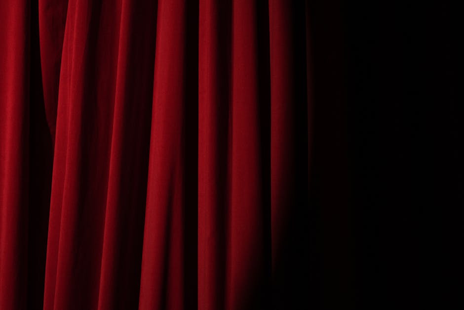 Spotlight on a Red Curtain