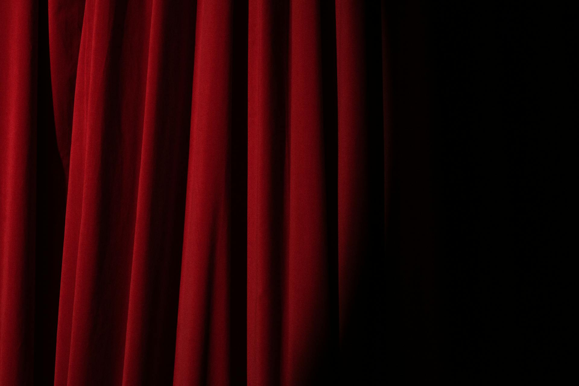 Spotlight on a Red Curtain