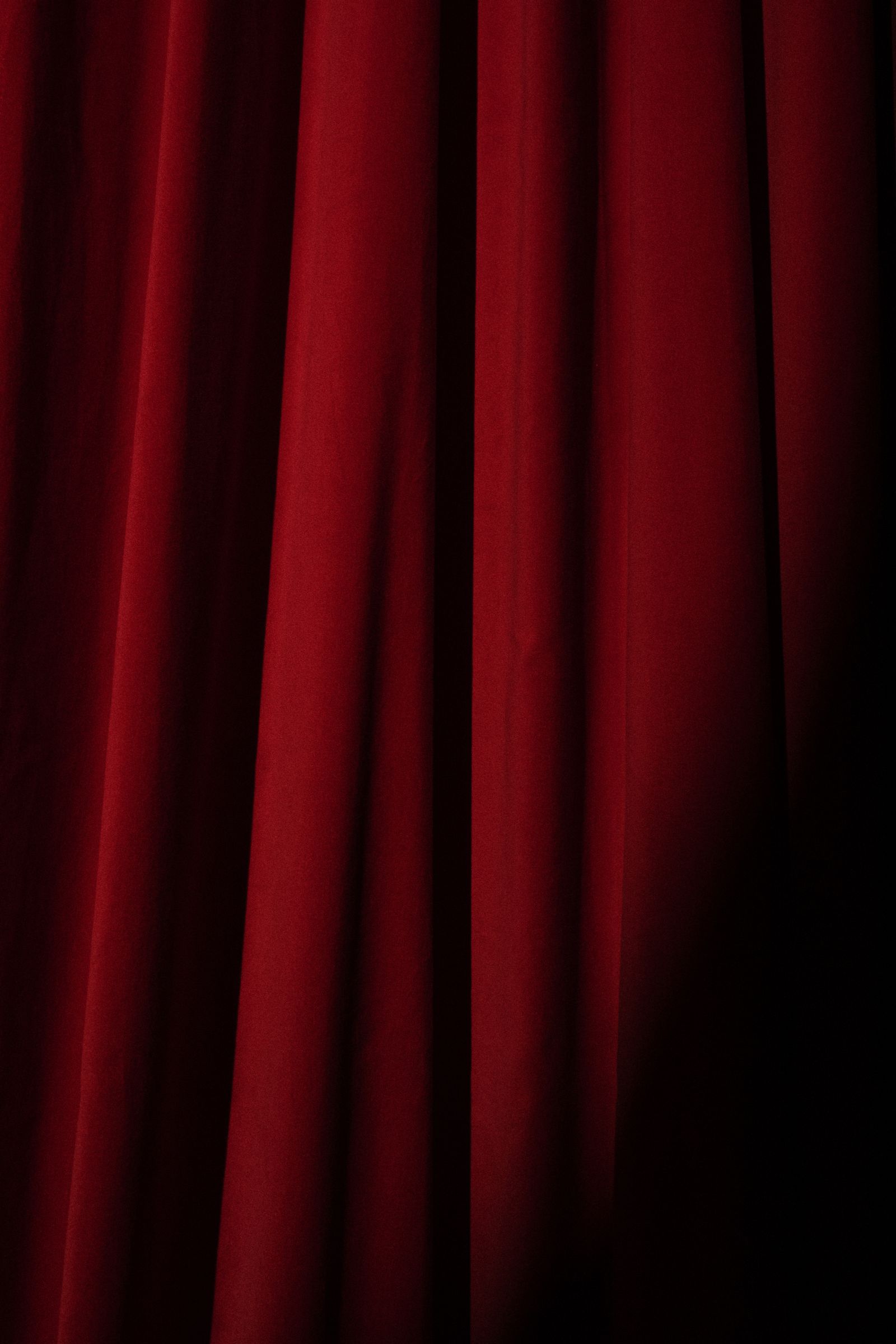 Deep red velvet booth curtain