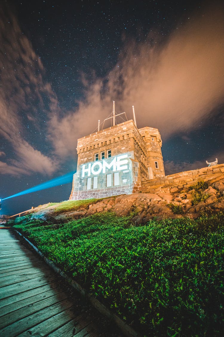 Laser Projection Of Word Home Of Facade Of Medieval Building